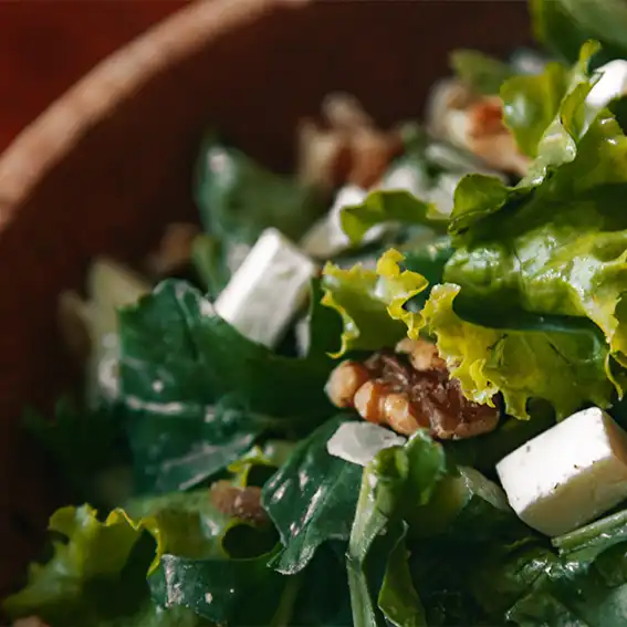 Baby Greens Salad with Candied Walnuts and Feta